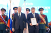 В День Конституции глава региона Роман Бусаргин вручил переходящий штандарт Губернатора Саратовской области ООО «Наше дело»